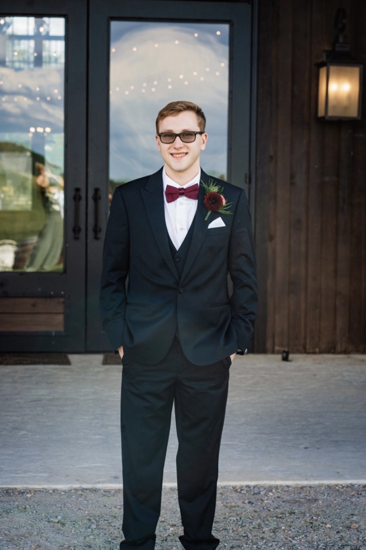  Nicholas Mamberger in his tux on his wedding day looking professional.